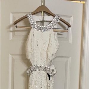 Macy’s designer prom or homecoming dress. Never worn! Size 0 white dress